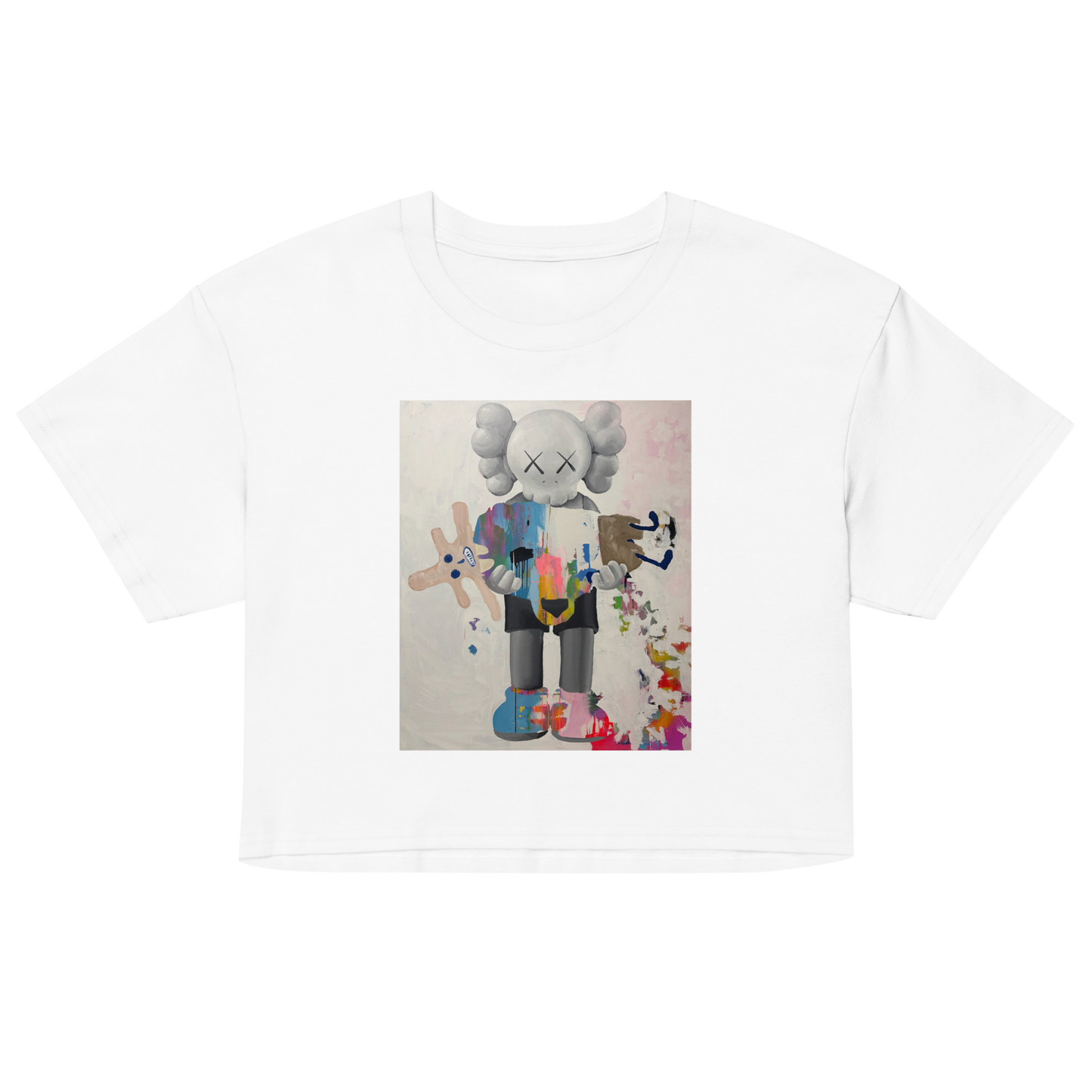 A white short-sleeve crop top t-shirt featuring a central graphic print of a stylized cartoon character in a colorful abstract art style, Daniel Maltzman artist.