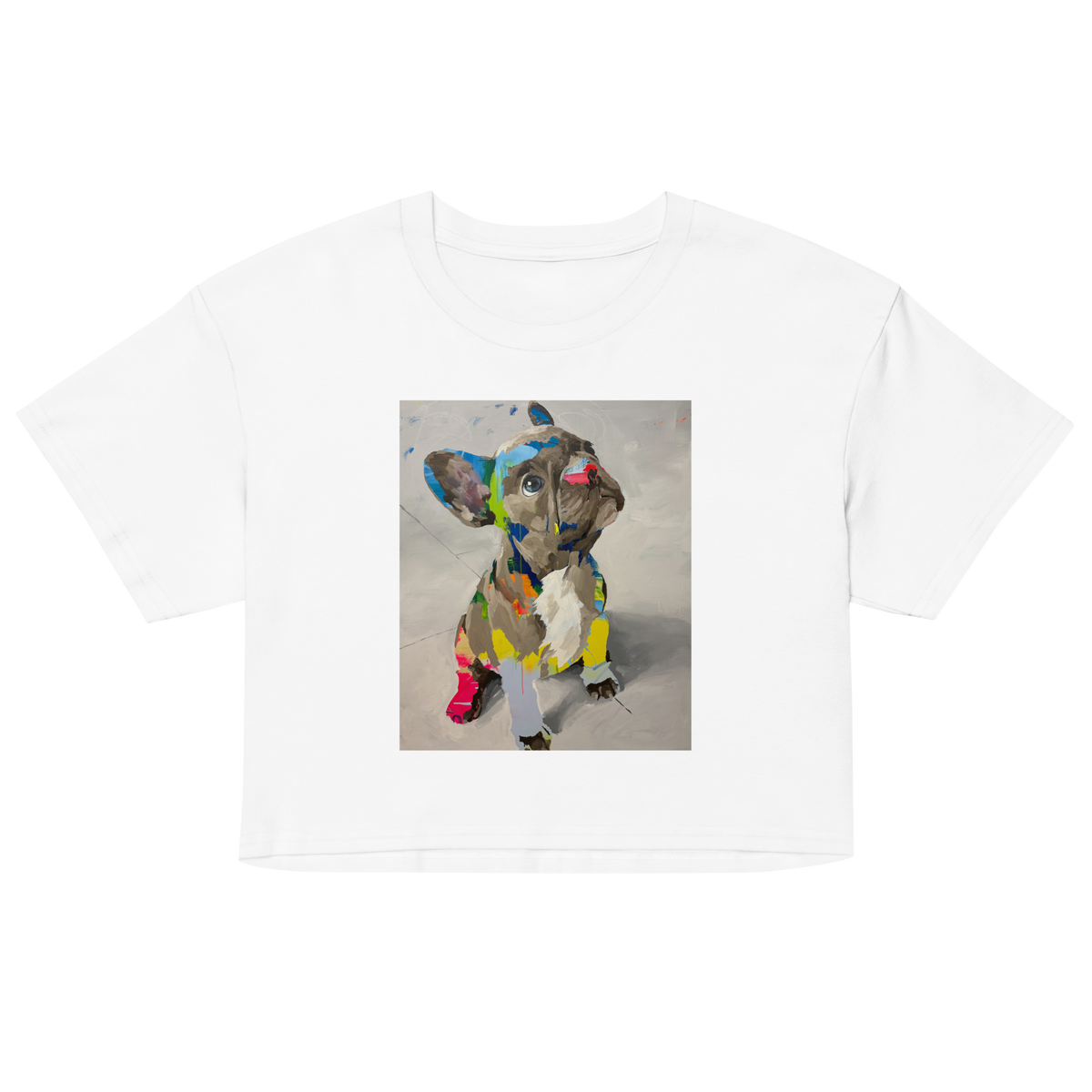 A white short-sleeve crop top t-shirt featuring a colorful graphic print of a French Bulldog on the front, Daniel Maltzman design.