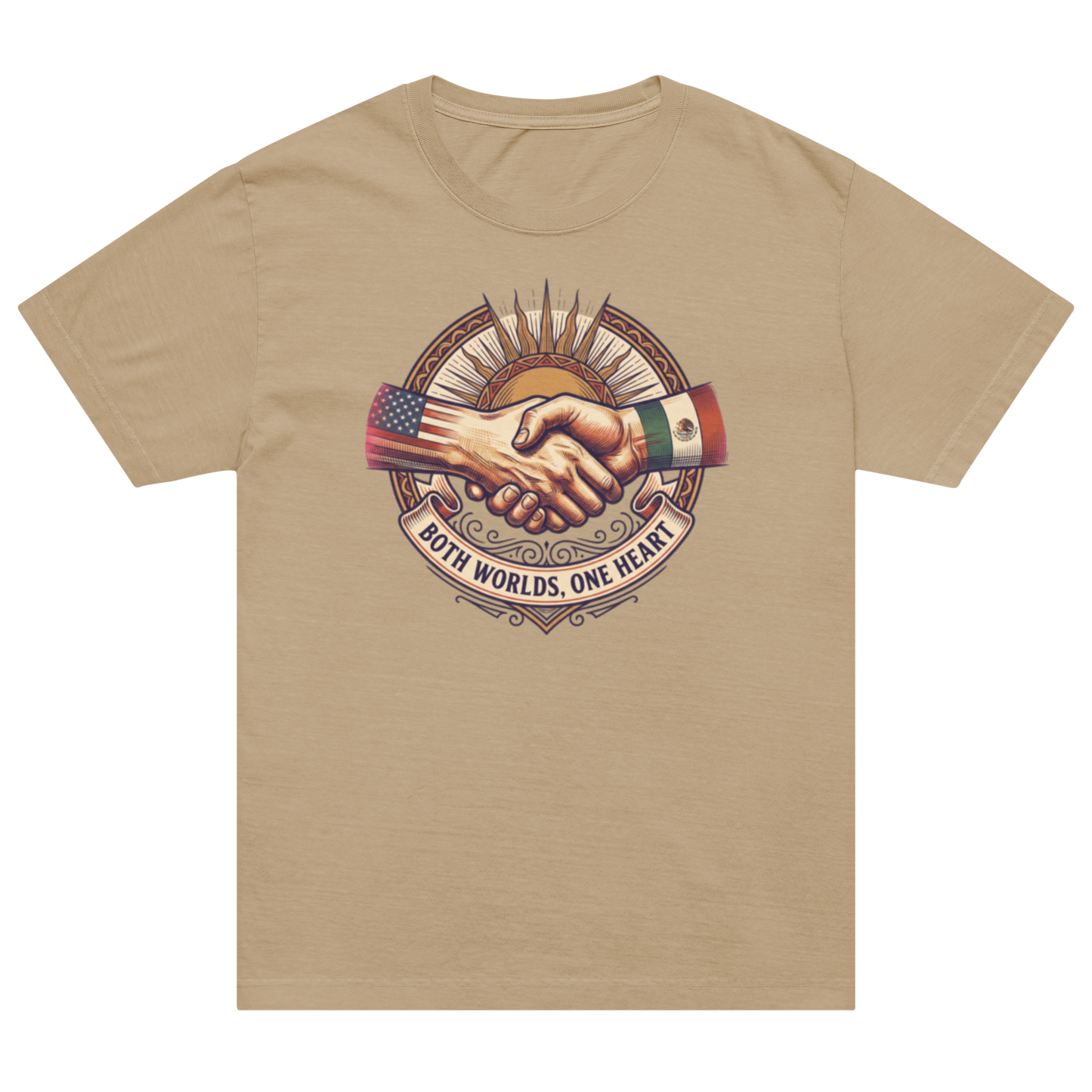 A beige crewneck t-shirt featuring a central graphic of a handshake with the American and Mexican flags and the text 'BOTH WORLDS, ONE HEART'.