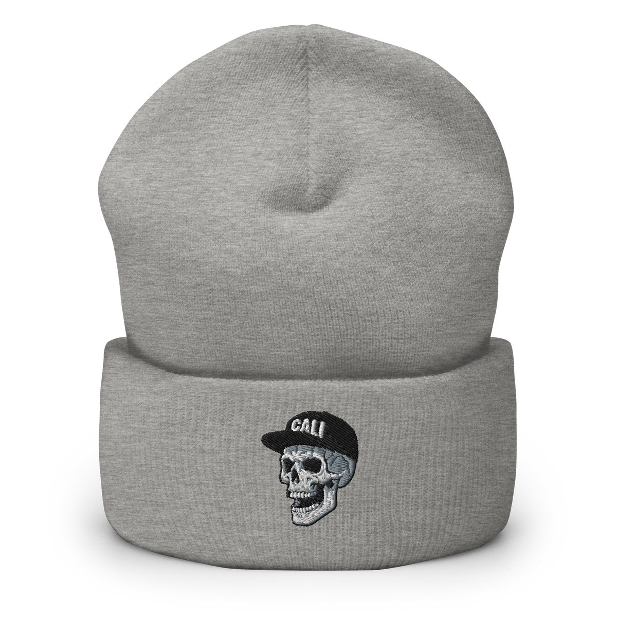 Gray beanie with a skull emblem wearing a Cali baseball hat on a white background