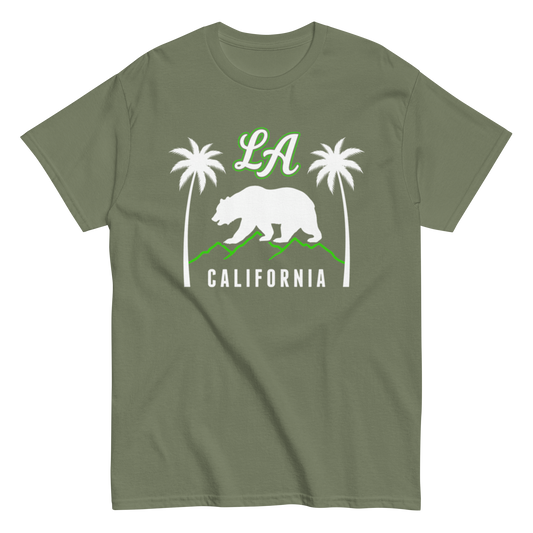 An olive green short-sleeve t-shirt with a California-themed graphic on the chest, featuring a white grizzly bear, two white palm trees, green 'LA' lettering, and 'CALIFORNIA' text.