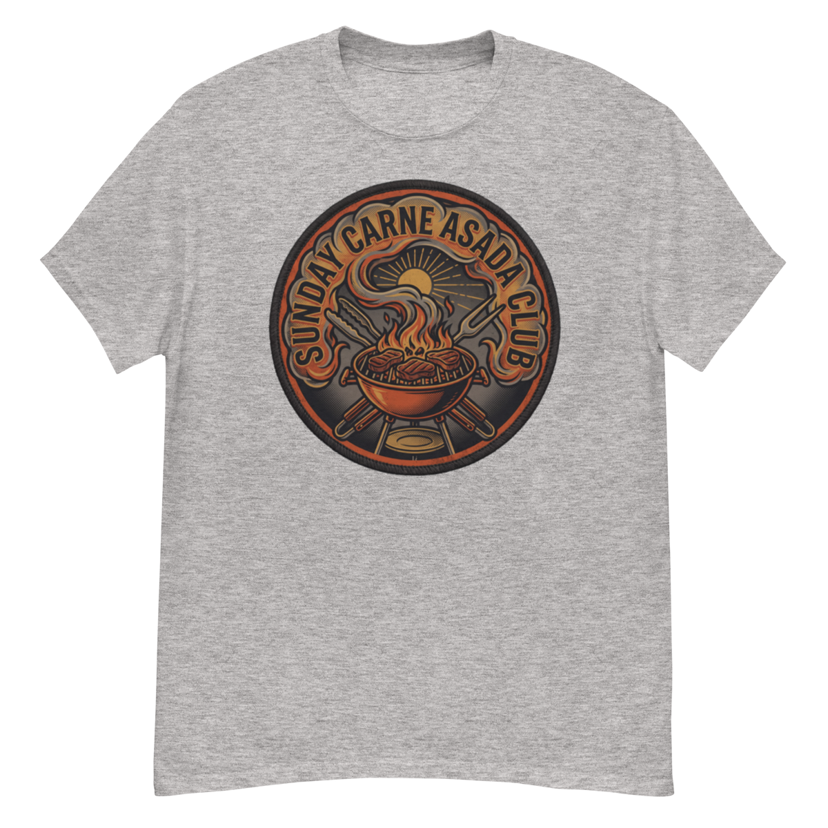A heather gray crewneck t-shirt featuring a circular graphic print on the chest. The graphic depicts a barbecue scene with a grill, steaks, and a bowl of soup, with the text 'SUNDAY CARNE ASADA CLUB' arched over the top.