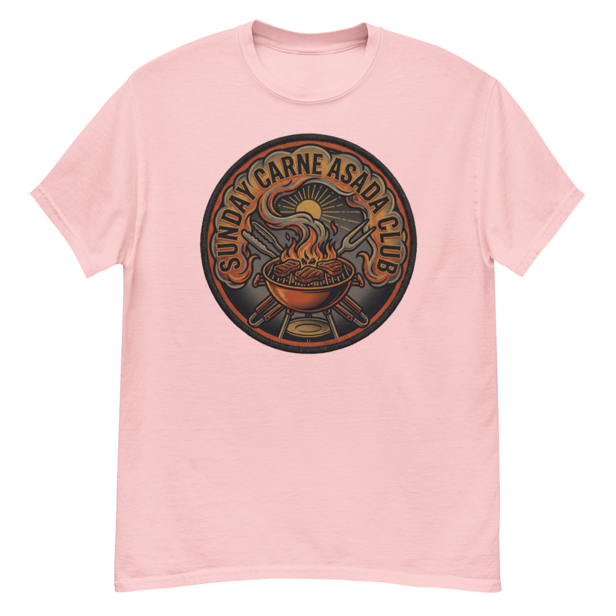 A light pink crewneck t-shirt featuring a circular graphic print on the chest with the text 'SUNDAY CARNE ASADA CLUB' surrounding a flaming grilled sandwich illustration.