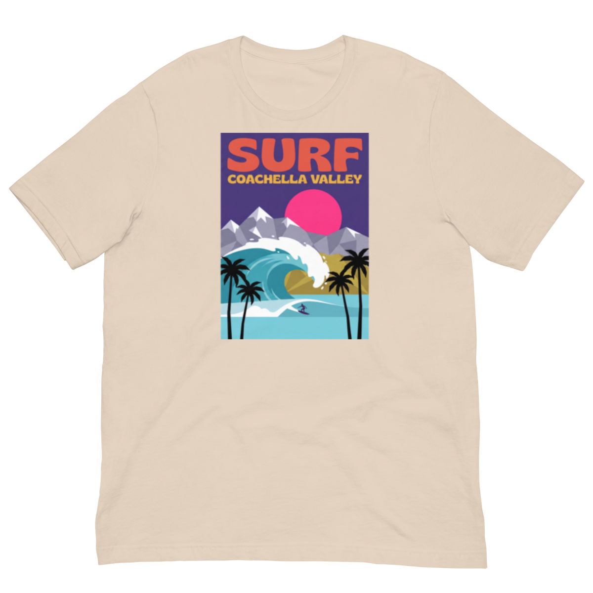 A beige crewneck t-shirt featuring a colorful retro-style graphic print of a surf in Coachella Valley, with a pink sun, blue wave, and palm trees.