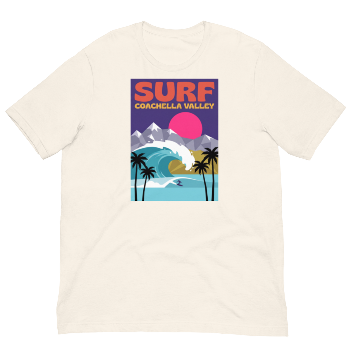 An off-white short-sleeve crewneck t-shirt featuring a colorful retro-style graphic print on the chest that reads 'SURF COACHELLA VALLEY' above an illustration of a wave, mountains, palm trees, and a pink sun.