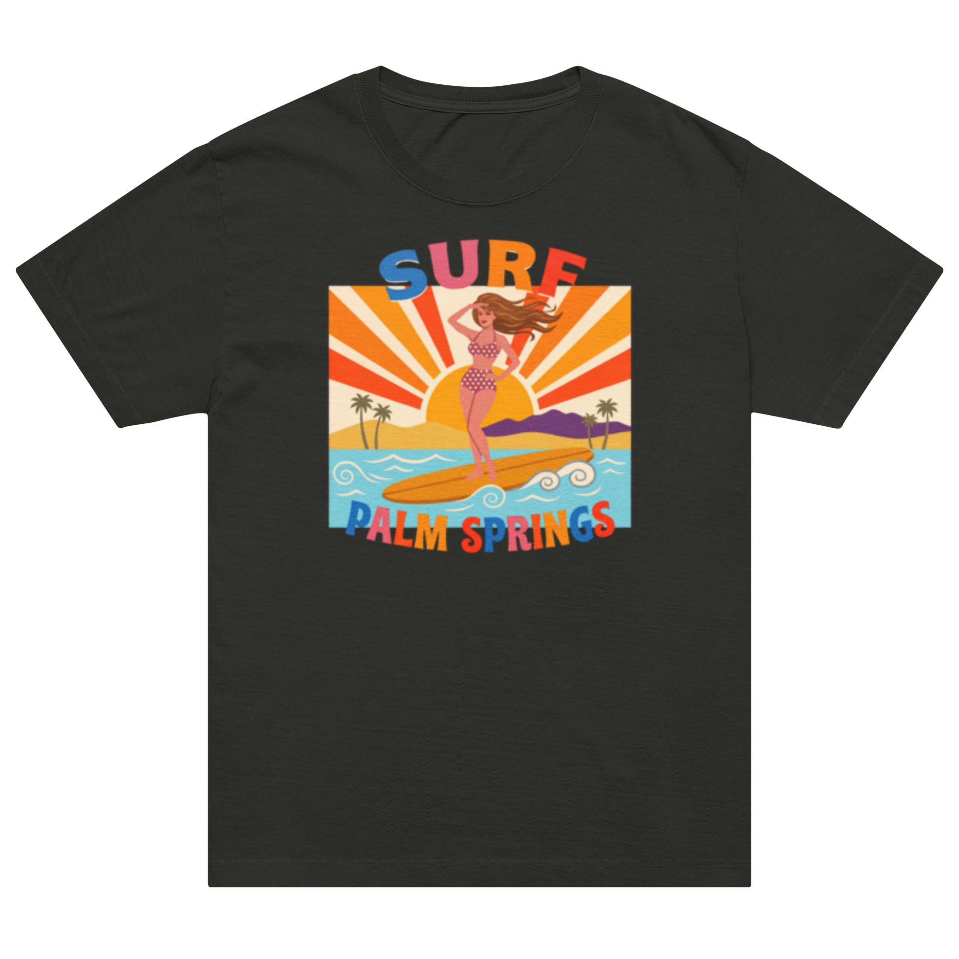 A black short-sleeve crewneck t-shirt featuring a colorful retro graphic of a woman surfing on a beach with a sunset, labeled 'SURF' and 'PALM SPRINGS'.