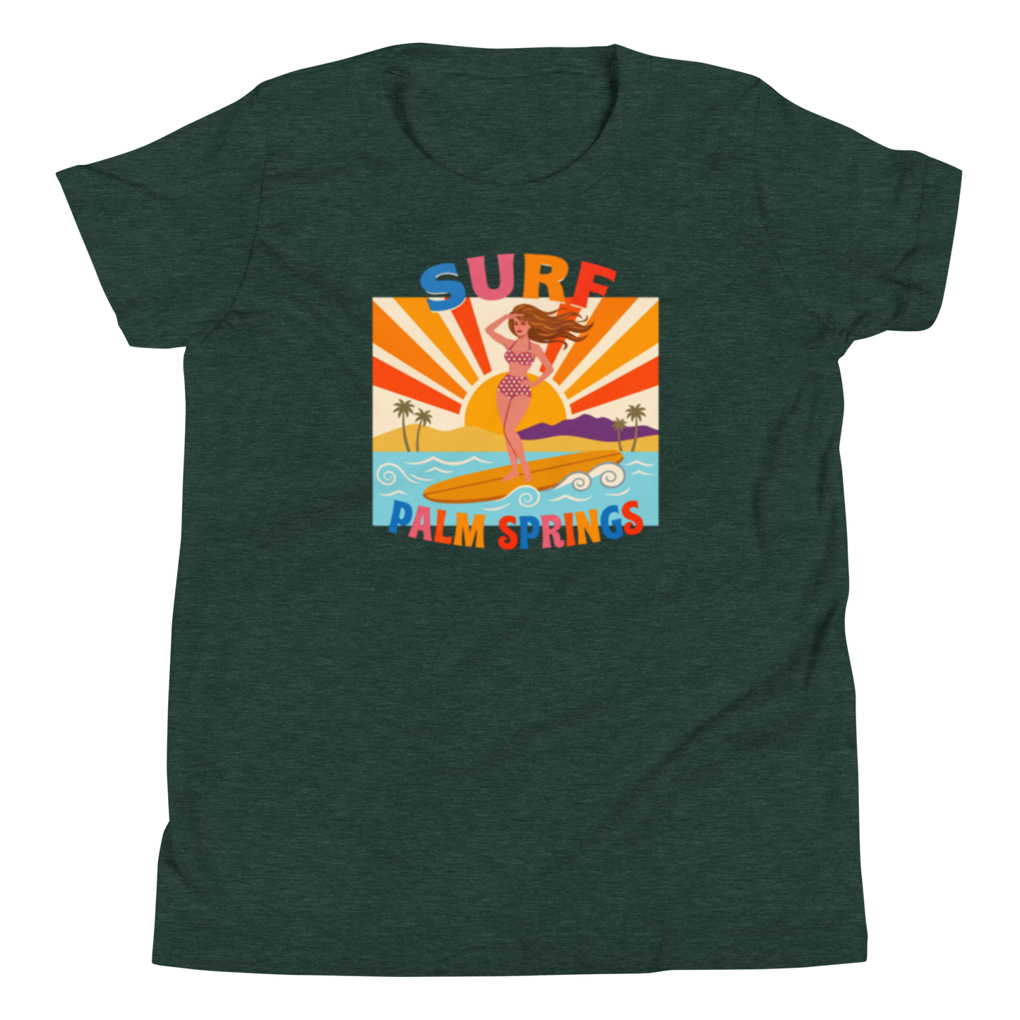 A women's heather dark green t-shirt featuring a colorful retro graphic of a mermaid surfing on a beach with the text 'SURF PALM SPRINGS'.