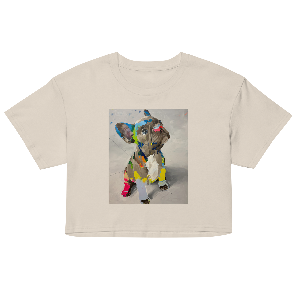 A bone short-sleeve crop top t-shirt featuring a colorful graphic print of a French Bulldog on the front, Daniel Maltzman design.