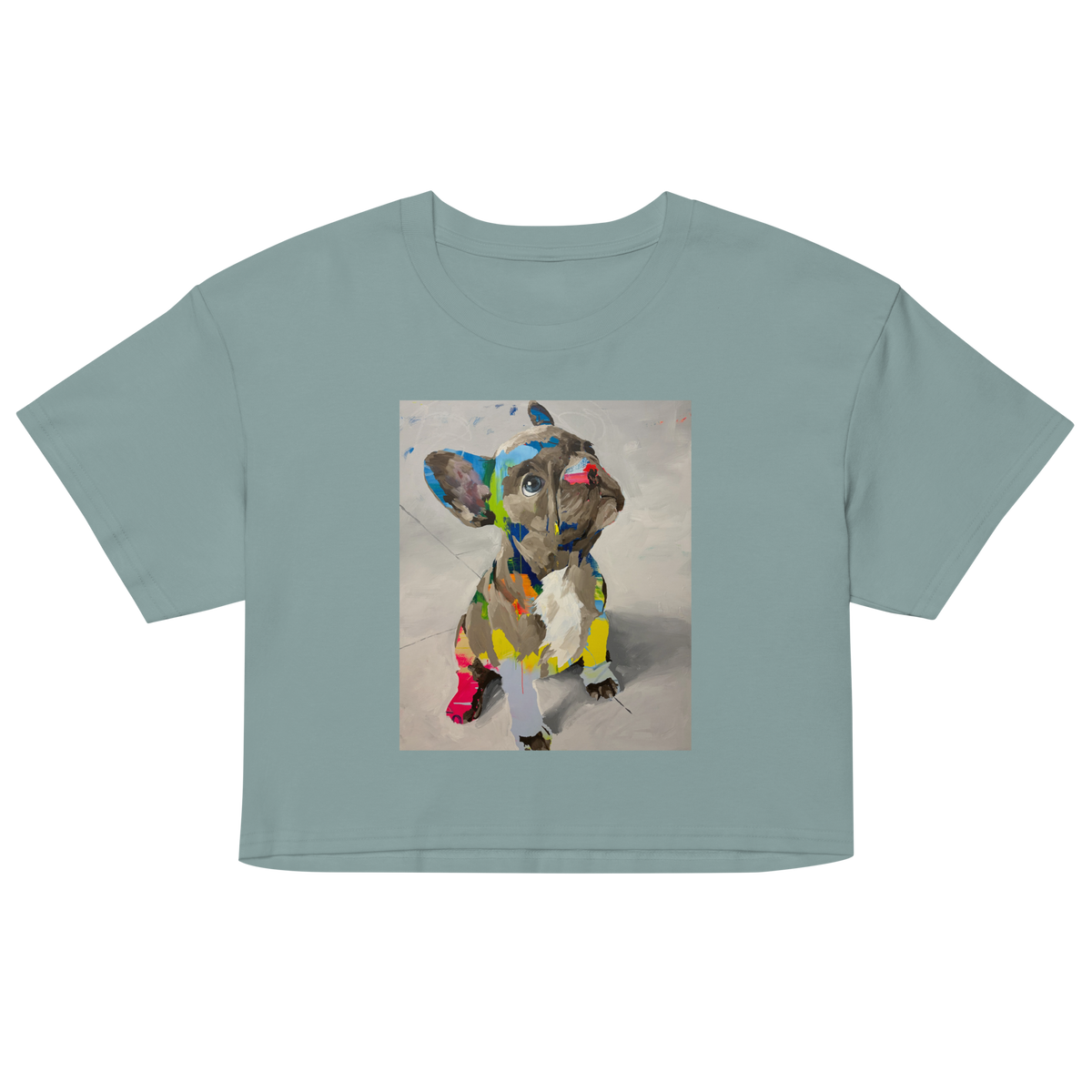 A sage green short-sleeve crop top featuring a colorful graphic print of a French Bulldog on the front, Daniel Maltzman artist.