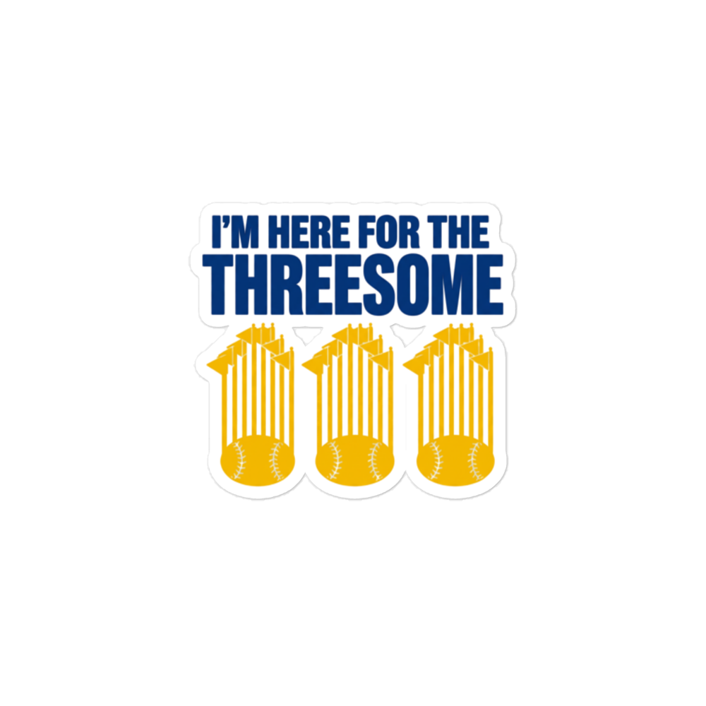 A die-cut sticker with the text 'I'M HERE FOR THE THREESOME' in bold blue letters above three yellow baseball glove-and-ball graphics, shown on a plain white background.