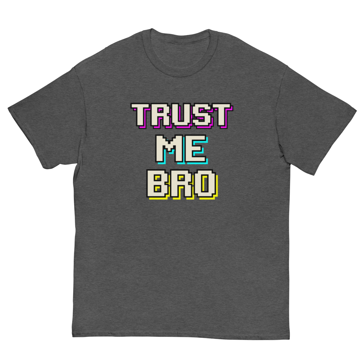 A dark heather gray crewneck t-shirt featuring a retro pixelated graphic on the chest that reads 'TRUST ME BRO' in white, purple, teal, and yellow block letters.