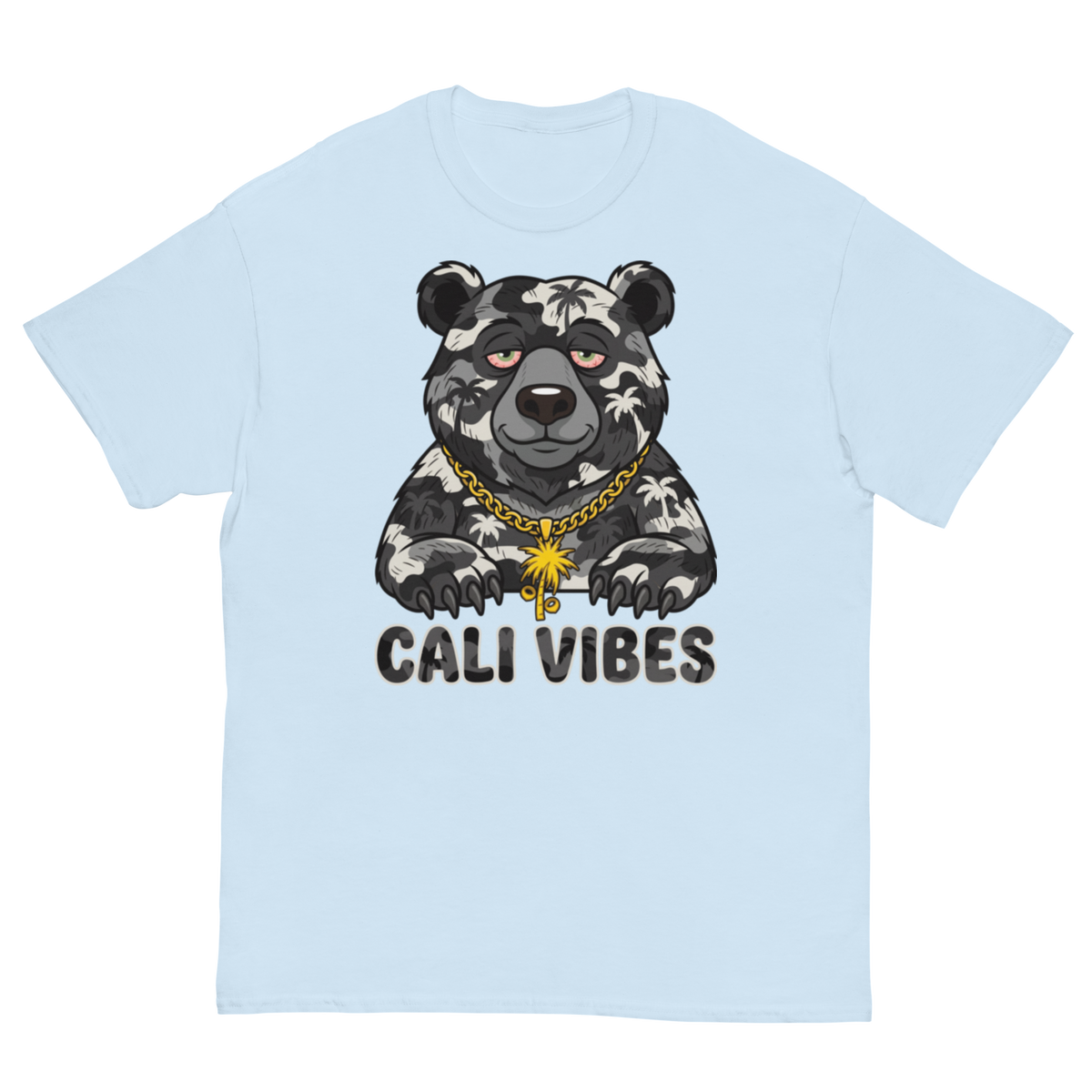 A light blue short-sleeve t-shirt with a graphic of a black and white patterned bear wearing a gold chain necklace, above the text 'CALI VIBES'.