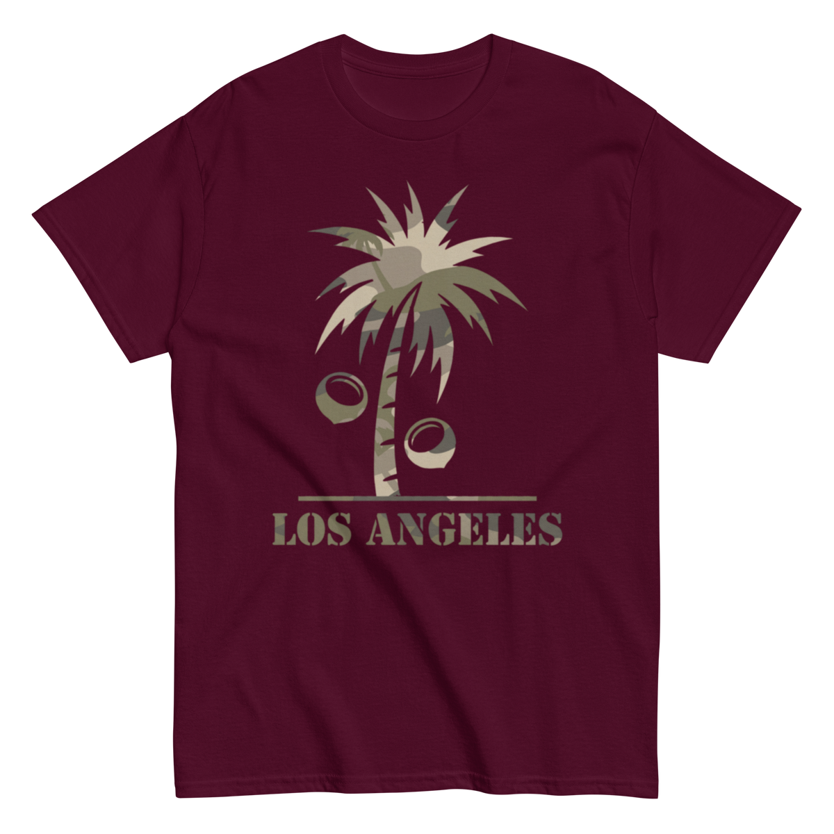 A maroon short-sleeve crewneck t-shirt featuring a graphic of a palm tree with coconuts and the text 'LOS ANGELES' printed in a distressed beige font, displayed on a solid white background.
