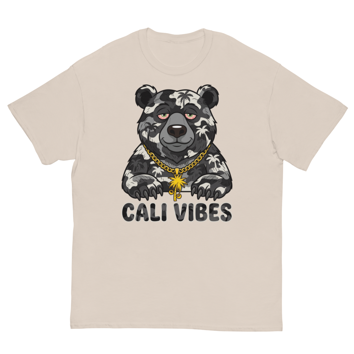 A beige crewneck t-shirt featuring a graphic of a bear with a Hawaiian shirt, a gold chain, and the text 'CALI VIBES' underneath.