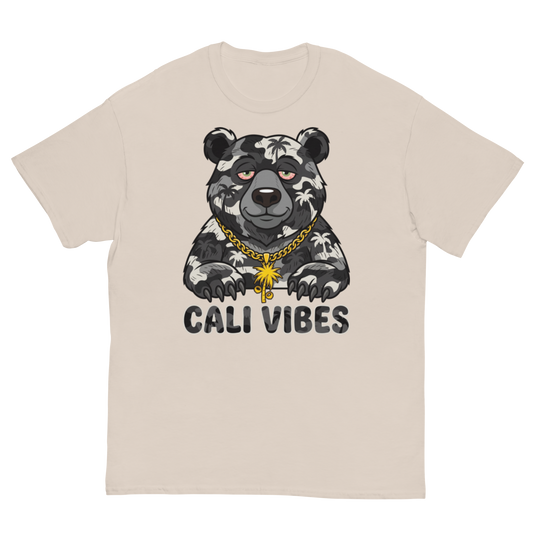 A beige crewneck t-shirt featuring a graphic of a bear with a Hawaiian shirt, a gold chain, and the text 'CALI VIBES' underneath.