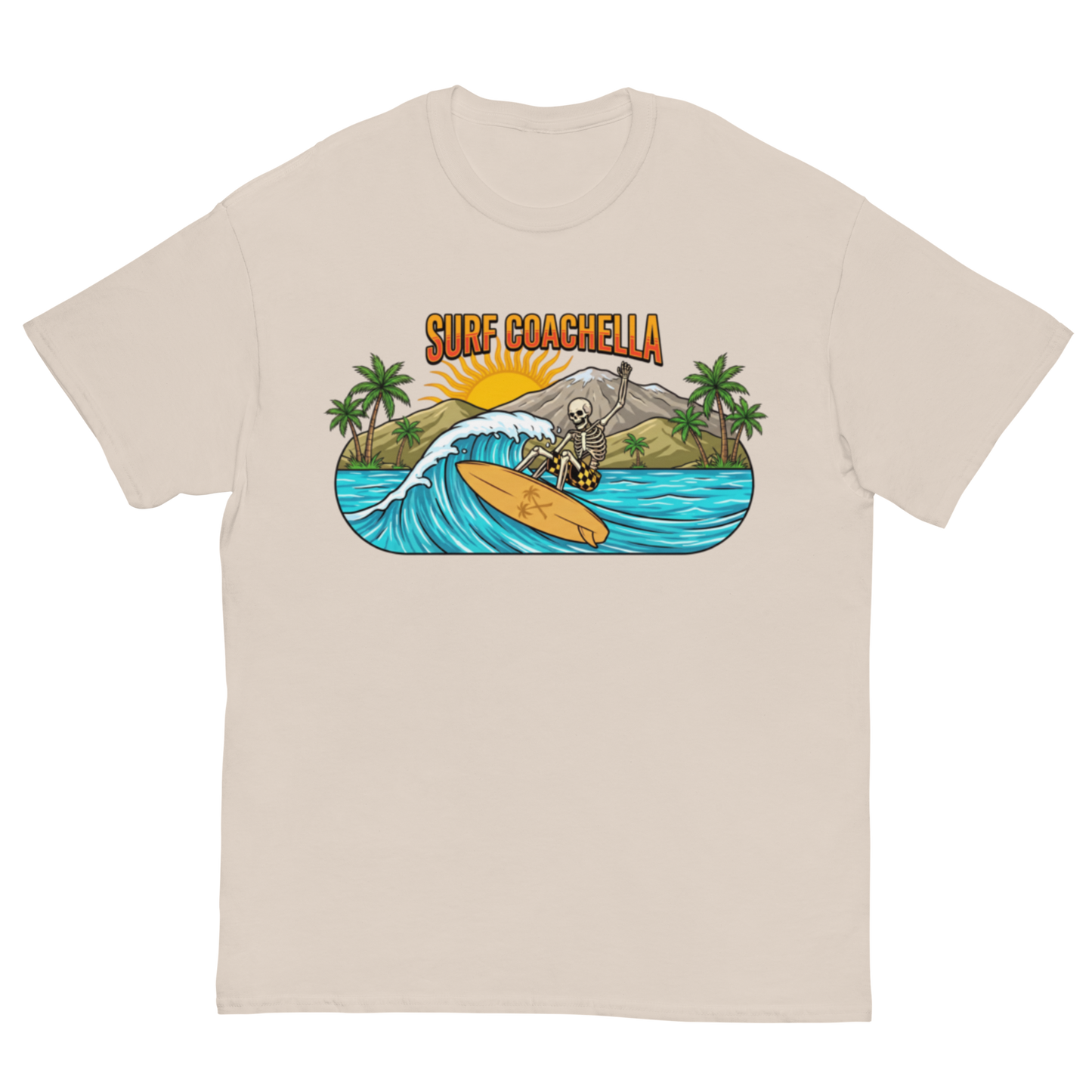 A beige crewneck t-shirt featuring a colorful graphic print of a skeleton surfing on a wave with the text 'SURF COACHELLA' above it, displayed on a clean white background.