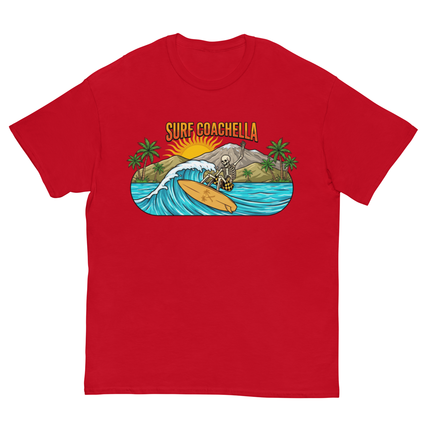 A red short-sleeve crewneck t-shirt featuring a colorful graphic print of a skeleton surfing on a wave with the text 'SURF COACHELLA' above it, set against a plain white background.