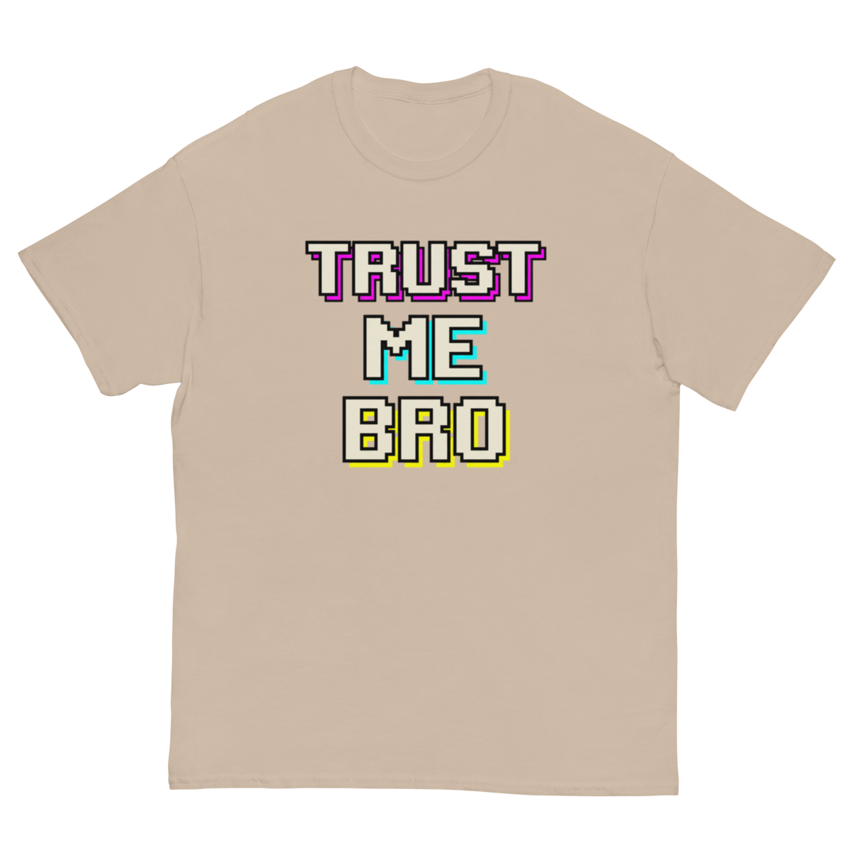 A beige crewneck t-shirt with a retro pixelated graphic on the chest that reads 'TRUST ME BRO' in white, purple, teal, and yellow block letters.