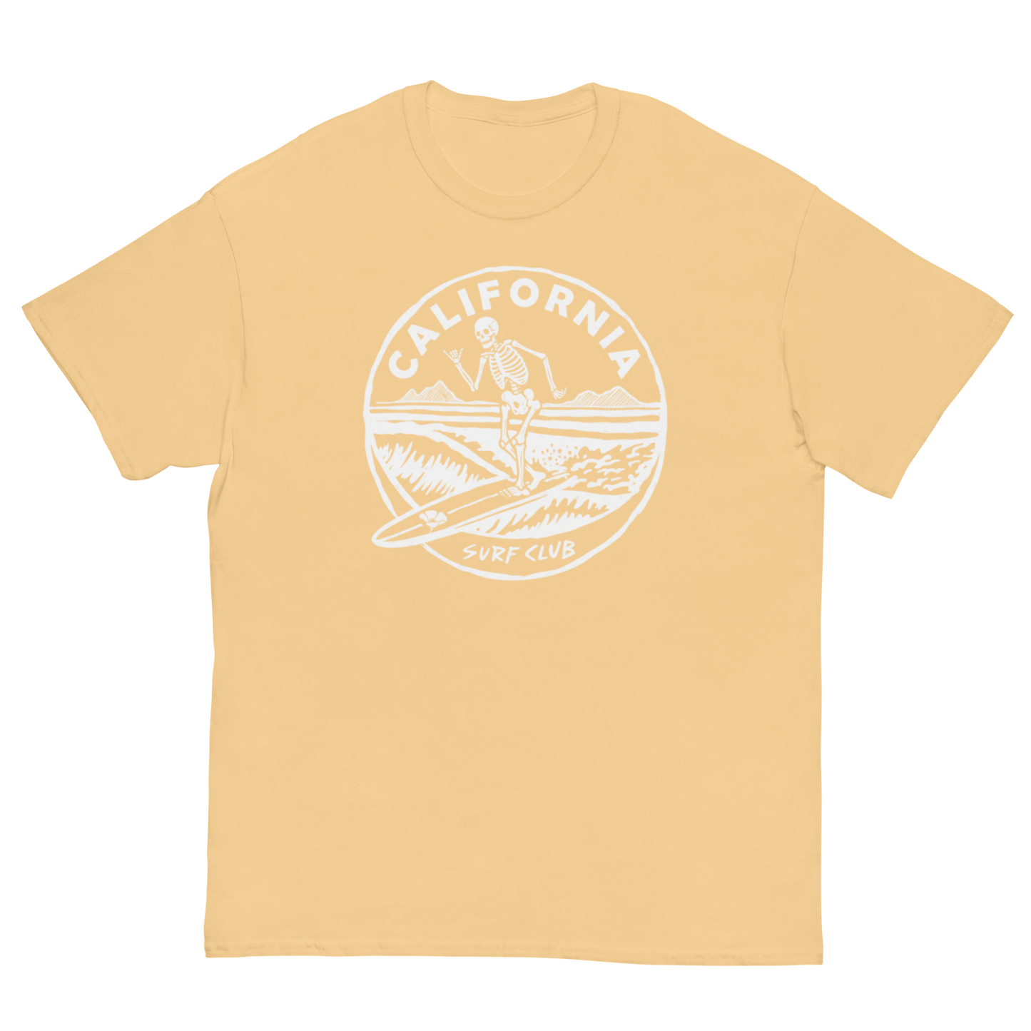 A pale peach-colored short-sleeve t-shirt with a white circular graphic on the chest featuring a skeleton surfer and the text 'CALIFORNIA SURF CLUB'.
