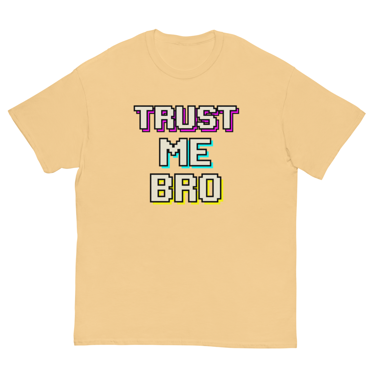 A light peach-beige short-sleeve t-shirt with a retro pixelated graphic on the chest reading 'TRUST ME BRO' in white, purple, cyan, and yellow outlines.