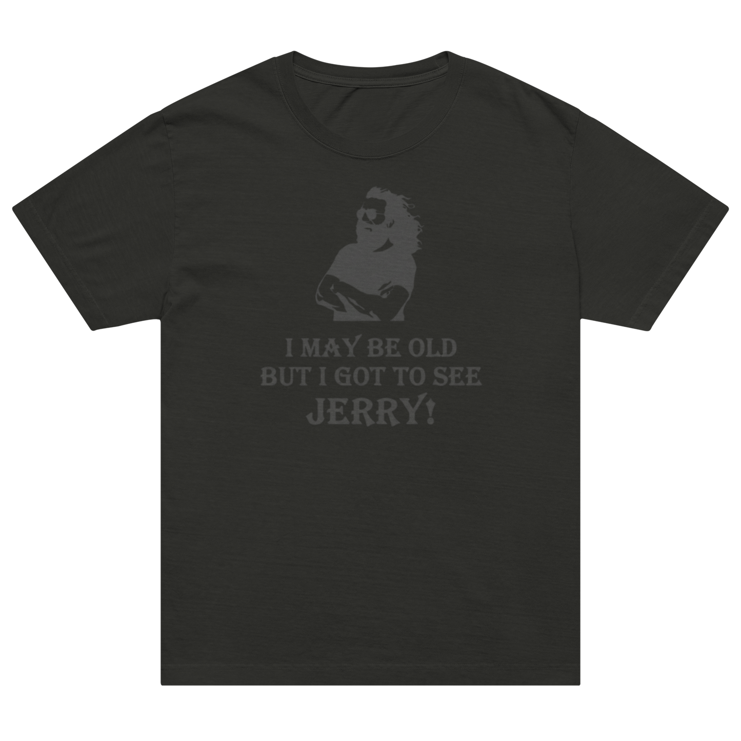 A dark charcoal gray short-sleeve t-shirt with a faded gray graphic on the chest showing a silhouette of a lion and the text 'I MAY BE OLD BUT I GOT TO SEE JERRY!'.