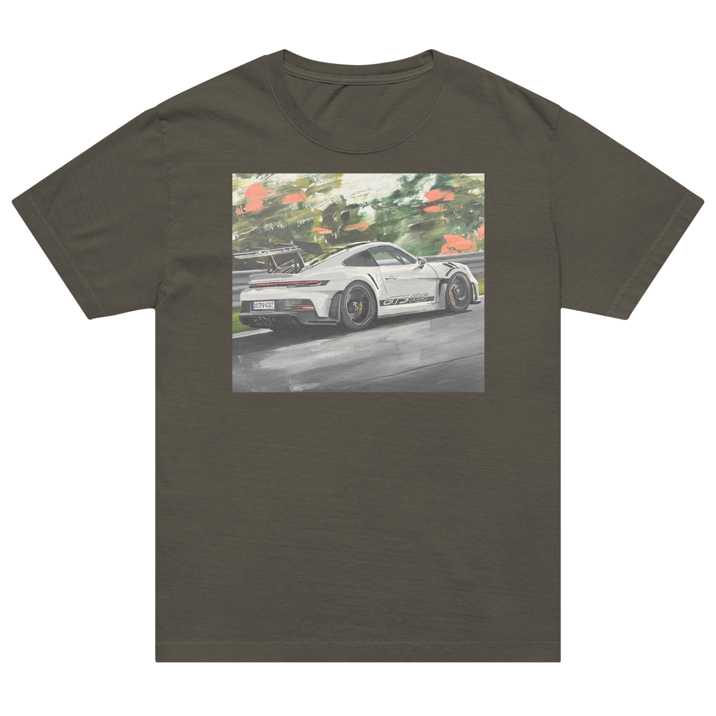 An olive green crewneck t-shirt featuring a square graphic print of a white sports car on a racetrack with green trees in the background. Daniel Maltzman artist.