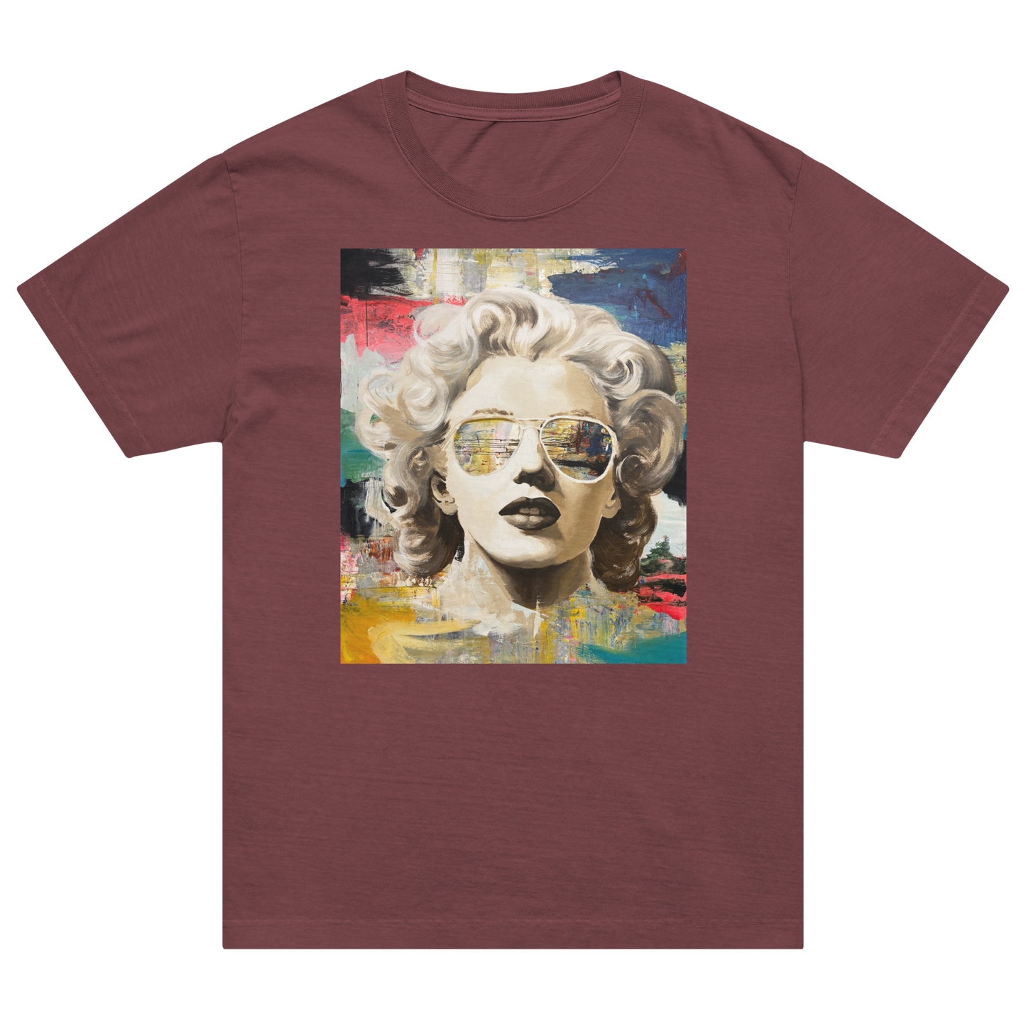 A short-sleeve crewneck t-shirt in maroon, featuring a colorful graphic print of a Marilyn Monroe portrait with sunglasses on the front. Daniel Maltzman artist.