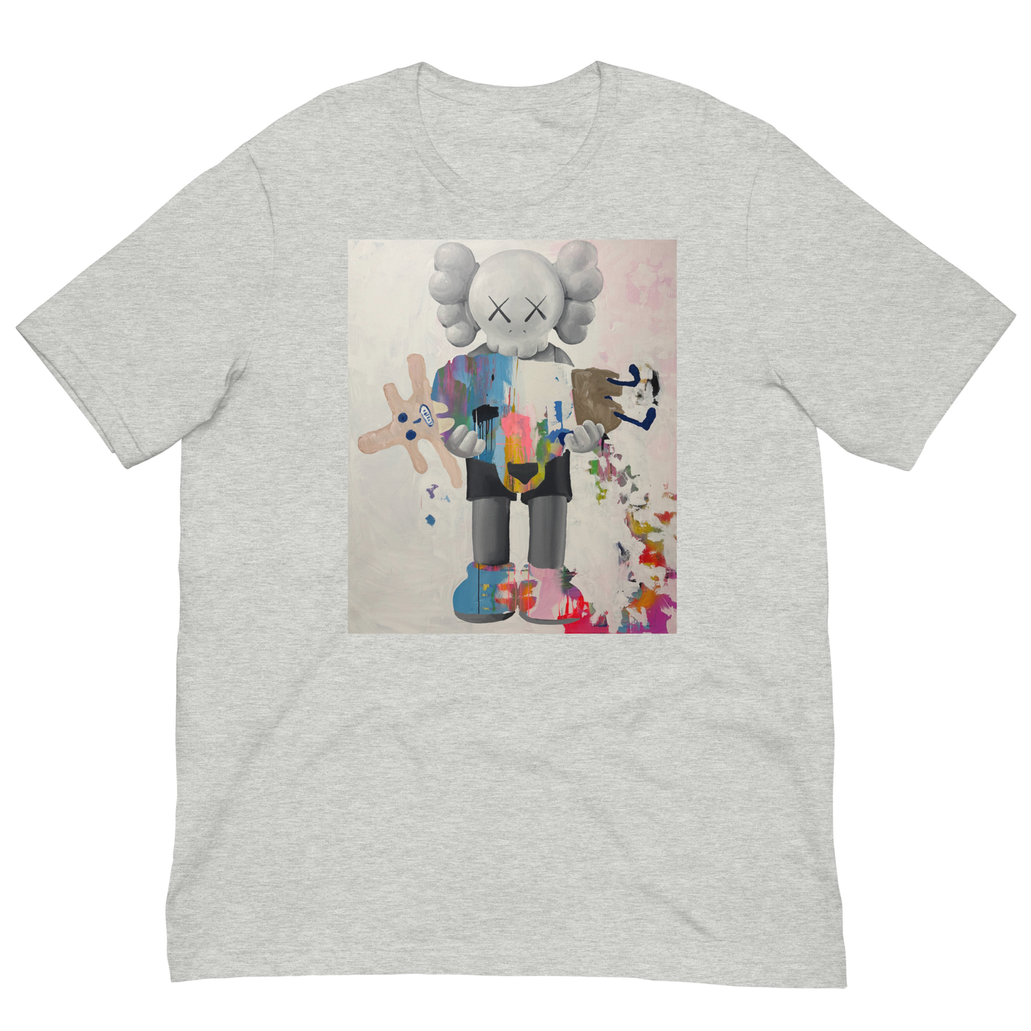 A light heather gray crewneck t-shirt featuring a central graphic print of a stylized cartoon character resembling KAWS, holding a pink plush toy, displayed on a solid white background. Daniel Maltzman artist. 