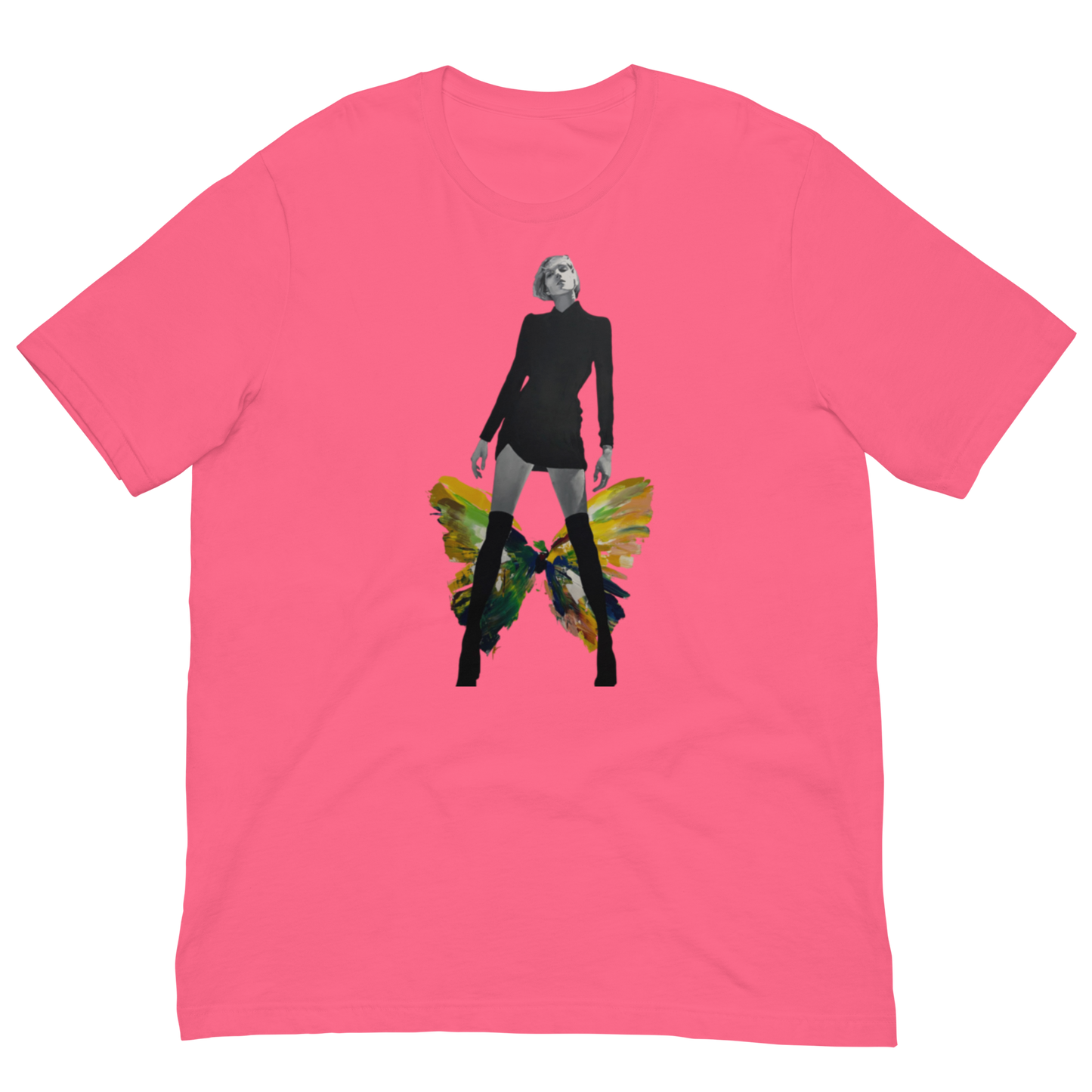 A bright pink short-sleeve crewneck t-shirt featuring a central graphic print of a stylized figure with a skull-like head, black outfit, and yellow-green wings, displayed on a solid white background. Daniel Maltzman artist.