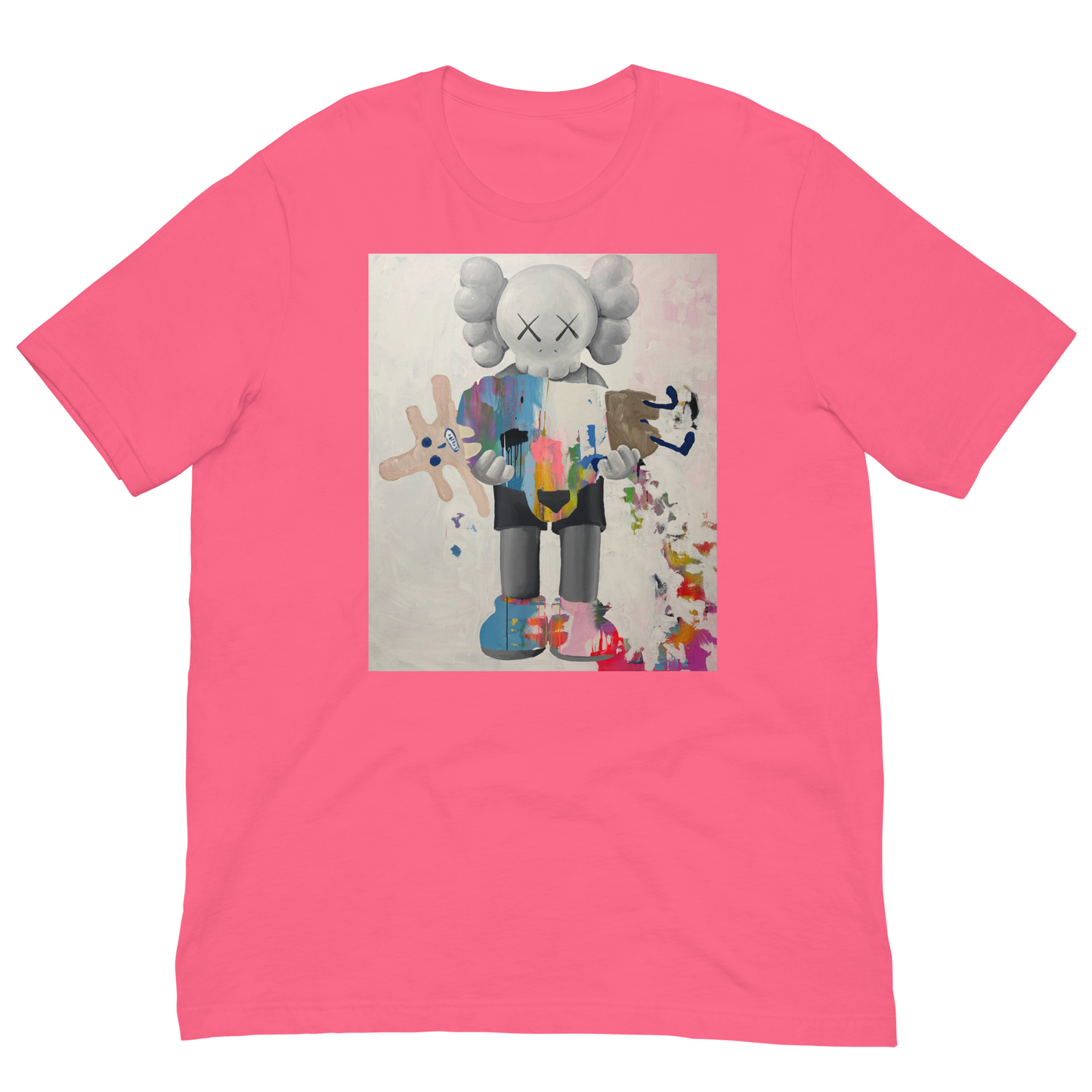 A bright pink short-sleeve crewneck t-shirt featuring a large square graphic print on the chest. The graphic depicts a stylized, colorful cartoon character resembling KAWS, holding a light brown plush toy, set against a light gray background. Daniel Maltzman artist. 