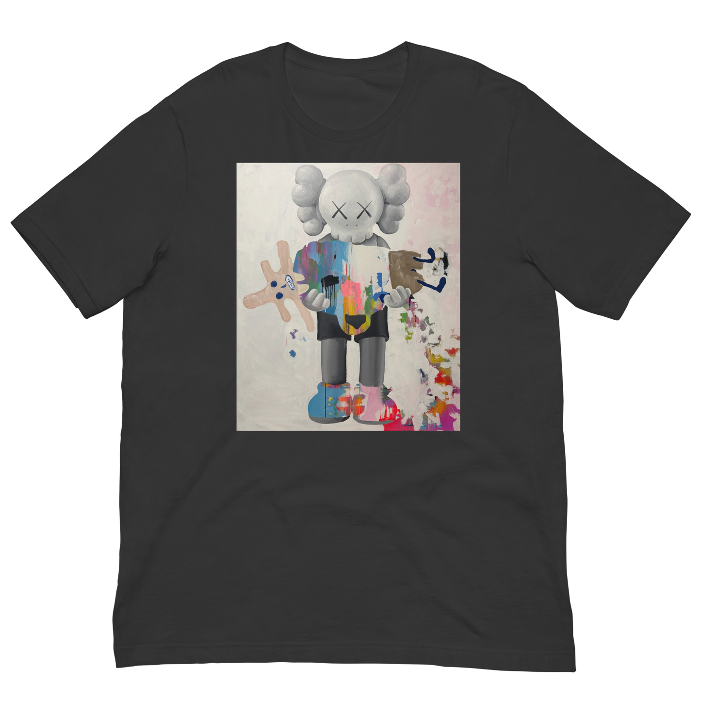 A dark charcoal gray short-sleeve t-shirt featuring a large rectangular graphic print on the chest. The graphic depicts a stylized cartoon character resembling KAWS, holding a pink plush toy, with a colorful paint splatter design on a light background. Daniel Maltzman artist. 