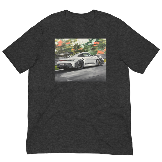 A dark heather gray short-sleeve t-shirt with a rectangular graphic print on the chest showing a white sports car on a racetrack with green trees in the background. Daniel Maltzman original desgn.