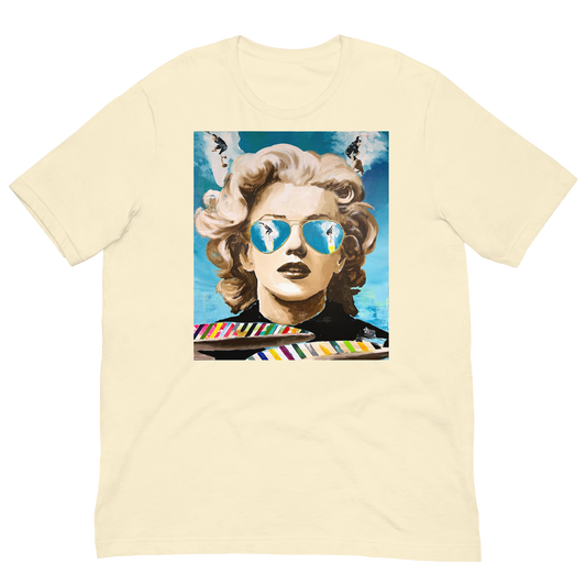 Beige t-shirt with a graphic of a woman with sunglasses and a palette. Daniel Maltzman artist. 