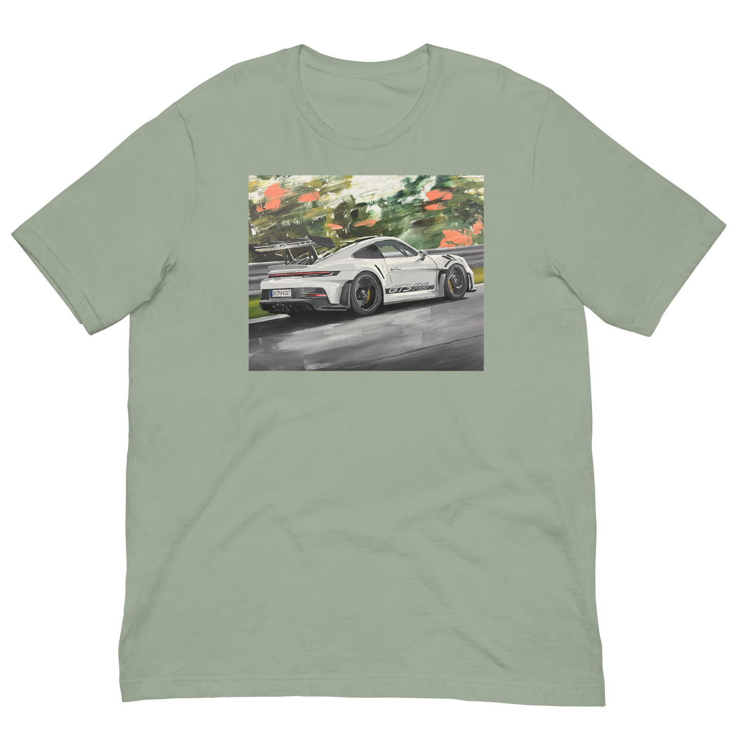 A sage green crewneck t-shirt featuring a rectangular graphic print of a white sports car on a wet racetrack with green trees in the background. Daniel Maltzman original desgn.