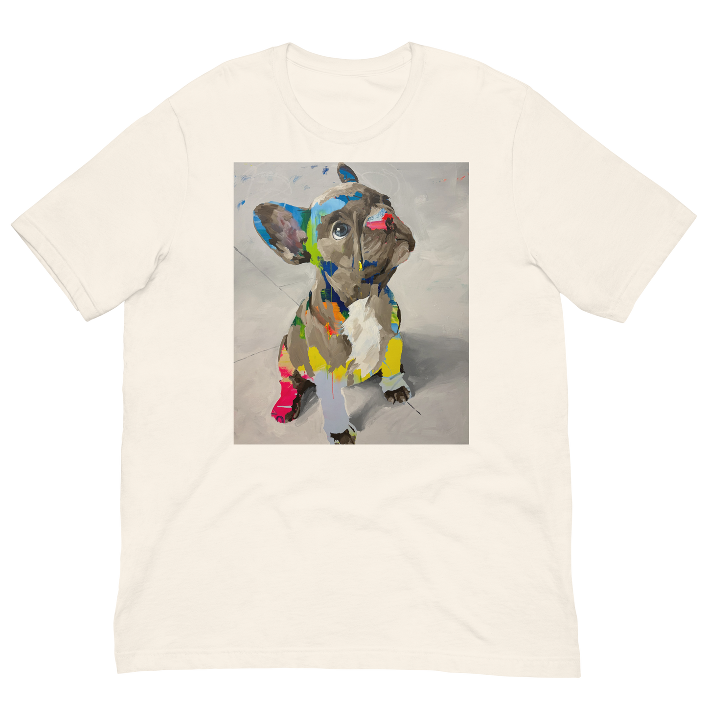 An off-white short-sleeve crewneck t-shirt featuring a square graphic print of a colorful, abstractly painted French Bulldog on the front, displayed against a solid white background. Daniel Maltzman artist. 