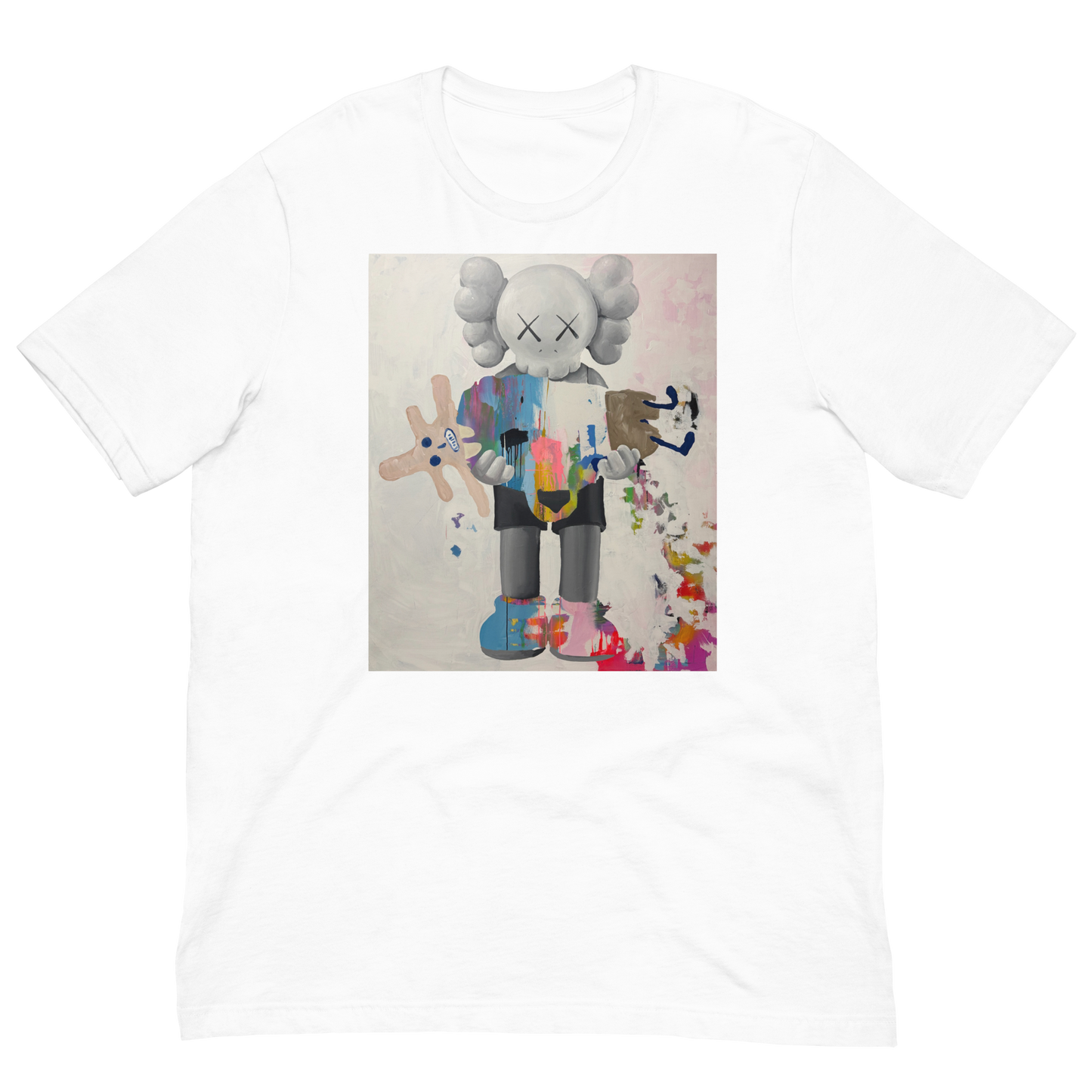 A white short-sleeve crewneck t-shirt featuring a central graphic print of a stylized cartoon character resembling KAWS, holding a pink and blue toy, displayed on a clean white background. Daniel Maltzman artist. 