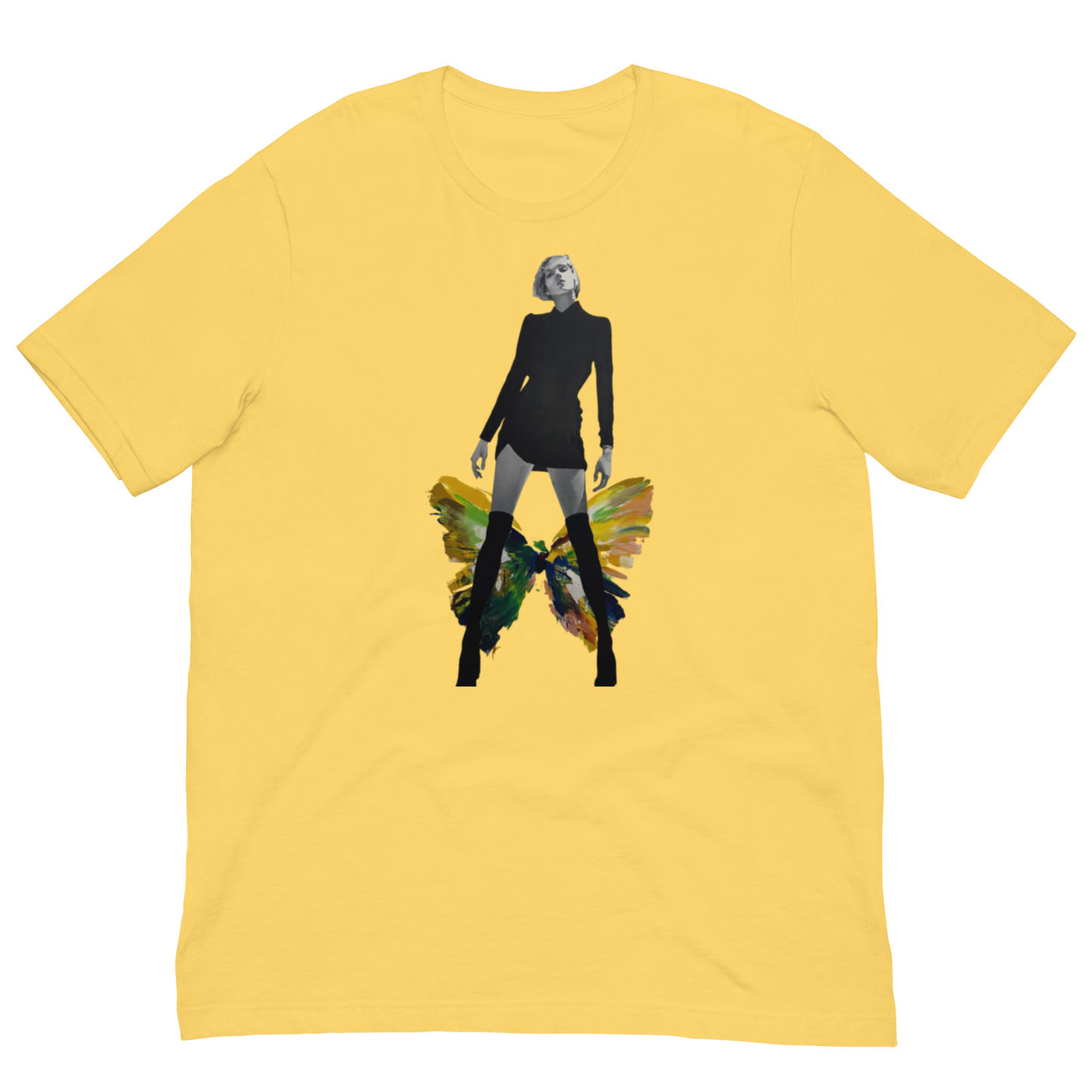A yellow short-sleeve crewneck t-shirt featuring a central graphic print of a stylized figure with a skull face, black outfit, and colorful wings in green, yellow, and orange. Daniel Maltzman artist.