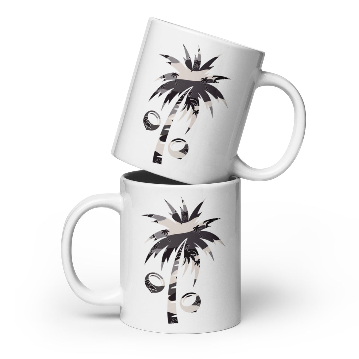 Two white ceramic mugs stacked with a tropical palm tree and coconut in tonal camo graphic printed on them, set against a clean white background.