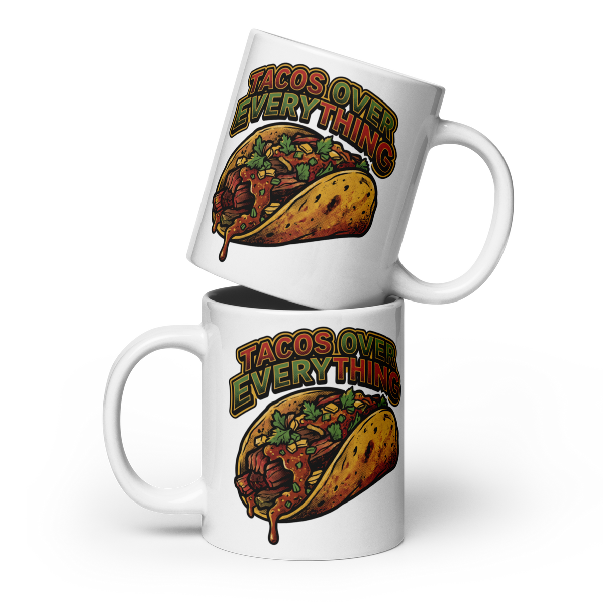Two white ceramic mugs stacked on a white background, each printed with the phrase 'TACOS OVER EVERYTHING' above an illustrated taco filled with meat, beans, and vegetables.