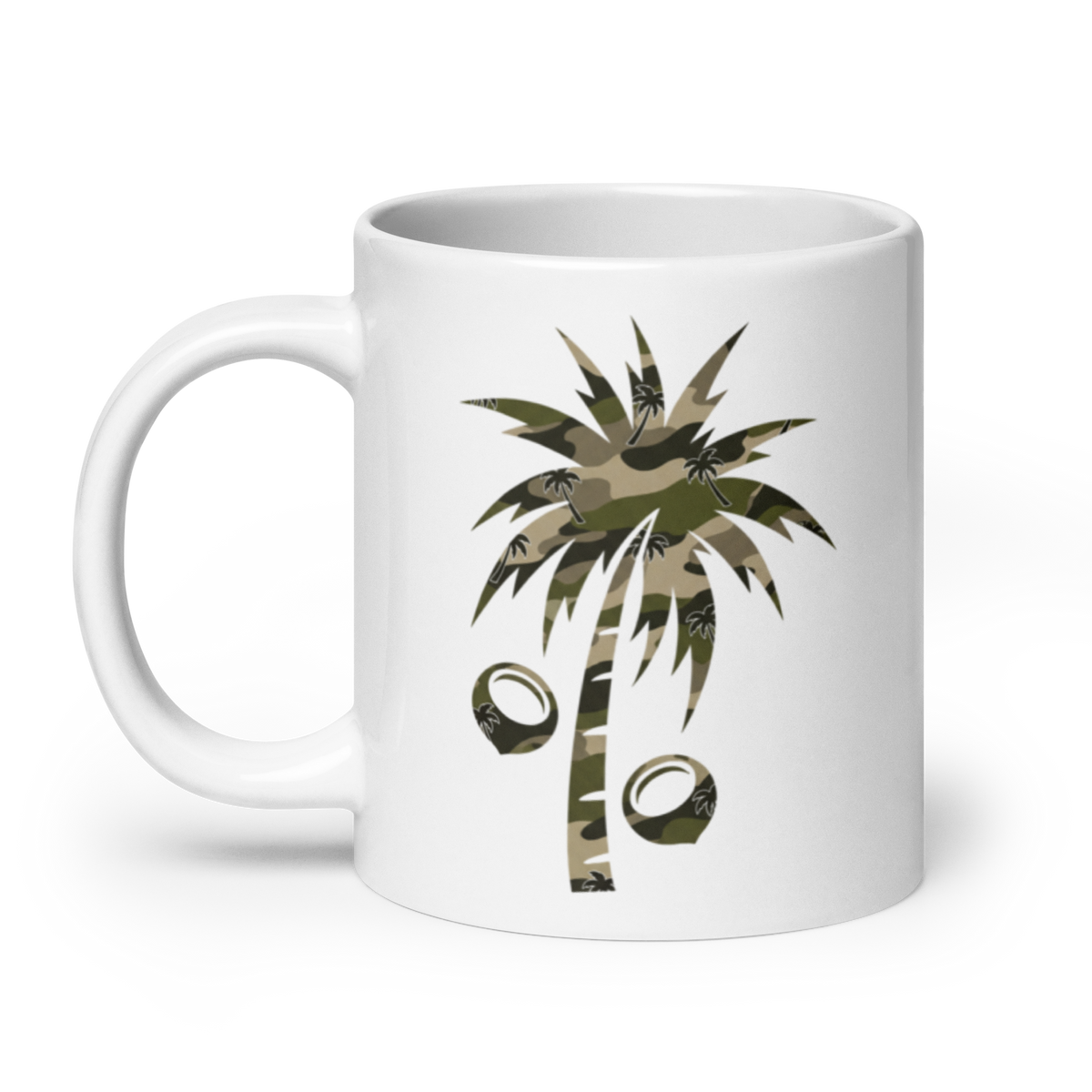 A white ceramic mug featuring a graphic of a palm tree with coconut shells.