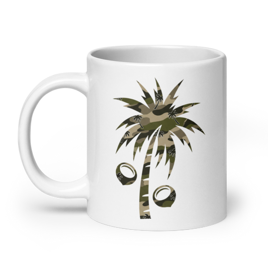 A white ceramic mug featuring a graphic of a palm tree with coconut shells.