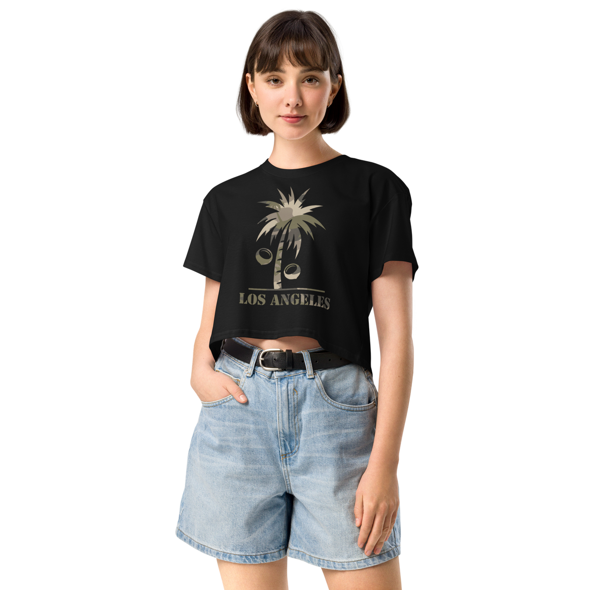 Person wearing a black t-shirt with 'Los Angeles' text and a camo palm tree with coconuts and denim shorts.