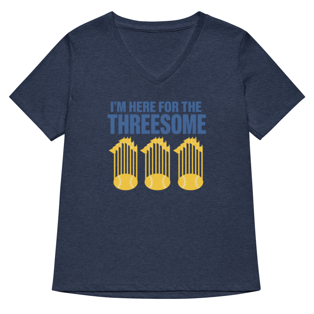 A navy blue heather V-neck t-shirt with a graphic print on the front. The graphic features the text 'I'M HERE FOR THE THREESOME' in light blue, above three yellow cages containing baseballs.