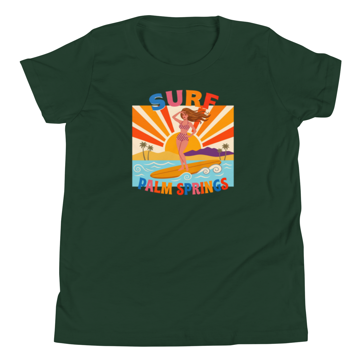 A dark green women's short-sleeve t-shirt with a colorful retro graphic on the chest. The graphic features a mermaid riding a surfboard with the text 'SURF' above and 'PALM SPRINGS' below, set against a beach and sunburst background.