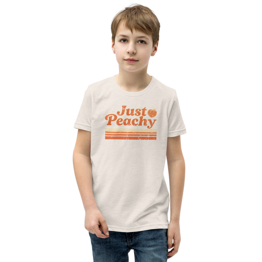 Child wearing a 'Just Peachy' t-shirt 