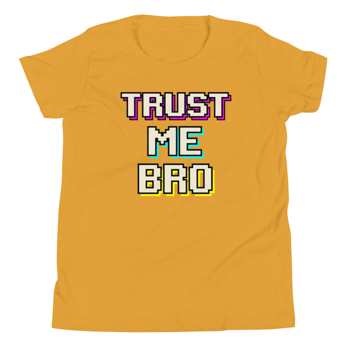 A mustard yellow short-sleeve t-shirt with a retro pixelated graphic reading 'TRUST ME BRO' in white, purple, cyan, and yellow outlines, displayed on a clean white background.