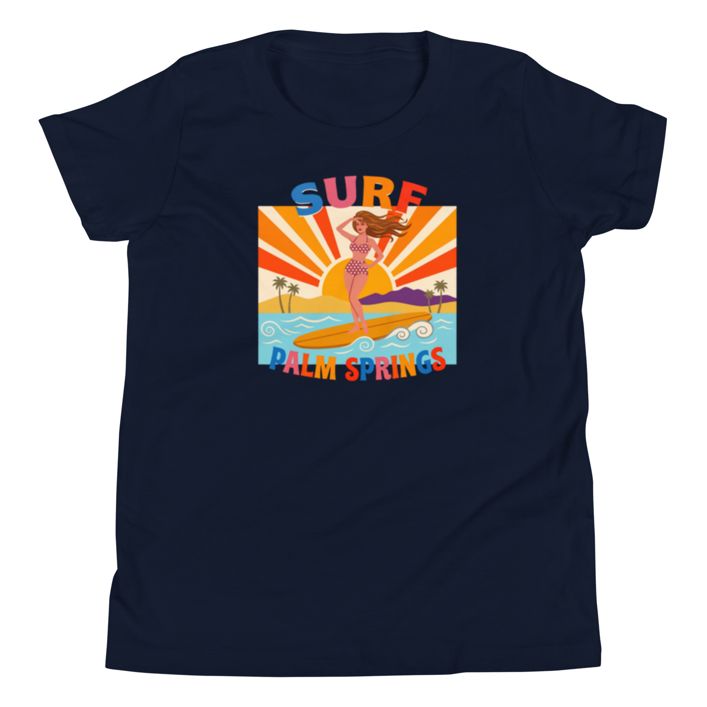 A navy blue short-sleeve crewneck t-shirt featuring a colorful retro graphic of a mermaid surfing on a beach with the text 'SURF PALM SPRINGS'.